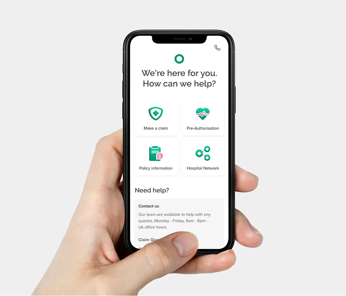 A hand holding a phone showing the William Russell app home screen